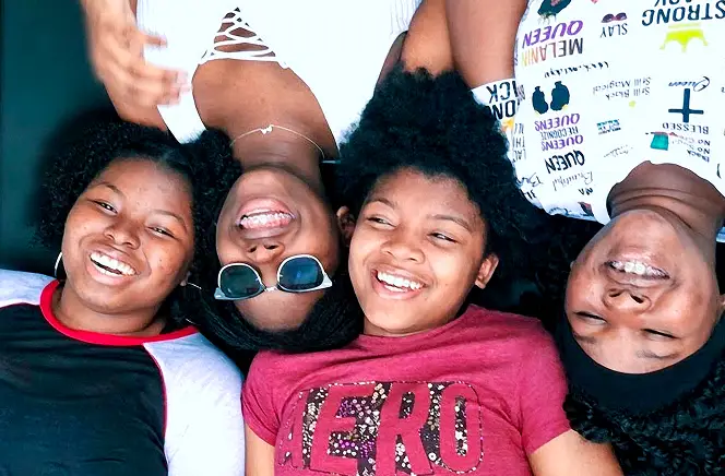a group of young people smiling