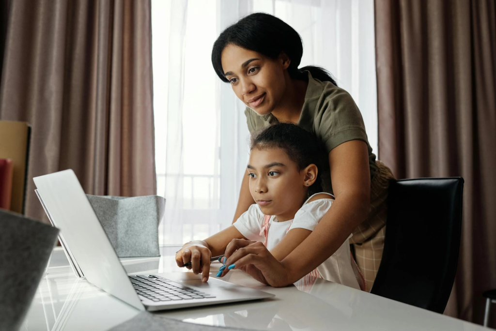 Parent and Child working at a computer