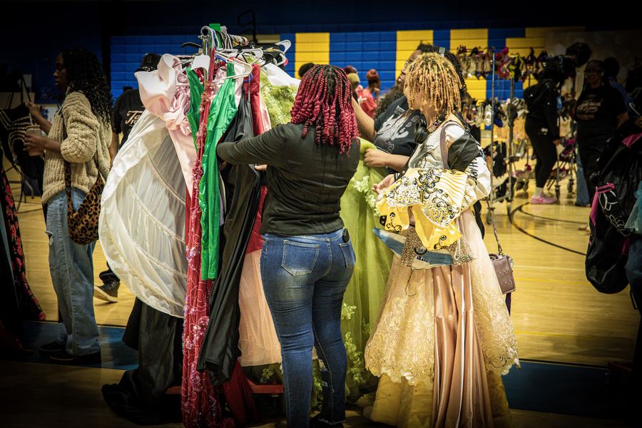 Racks of gowns at a 2026 Mobile Prom Boutique stop